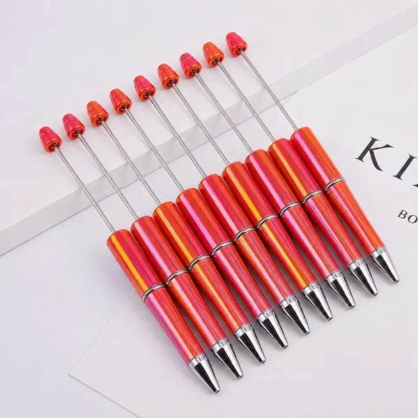 Pack de 10 Plumas Naranja Tornasol