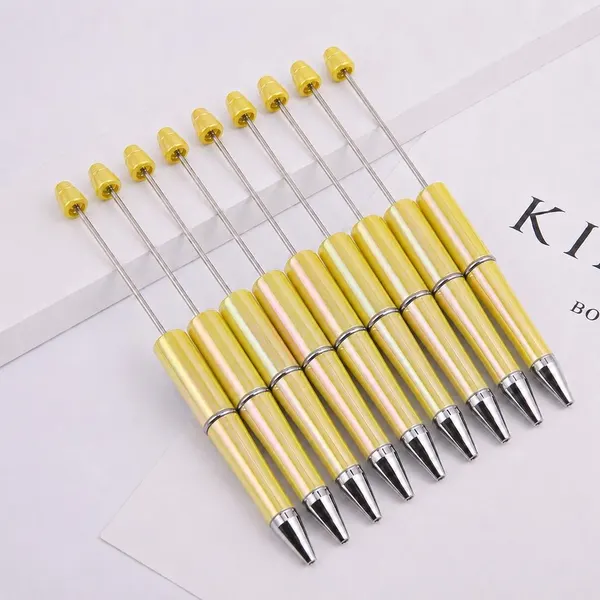 Pack de 10 Plumas Amarillas Tornasol